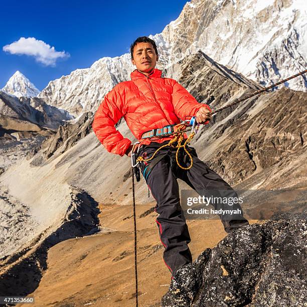 nepali "everest sherpa" climbing in himalayas - sherpa nepal stock pictures, royalty-free photos & images