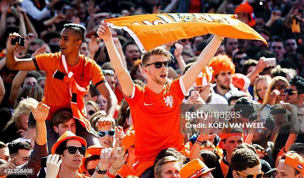 Crowds cheer during the Kingsland Festival during King's Day , a celebration of the birthday of the king of the Netherlands, on April 27, 2015 in...