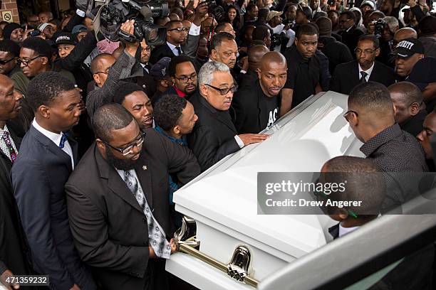 Pallbearers carry the casket of Freddie Gray to the hearse after his funeral service at New Shiloh Baptist April 27, 2015 in Baltimore, Maryland....