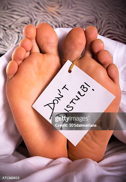 don't disturb! - morgue feet stock pictures, royalty-free photos & images