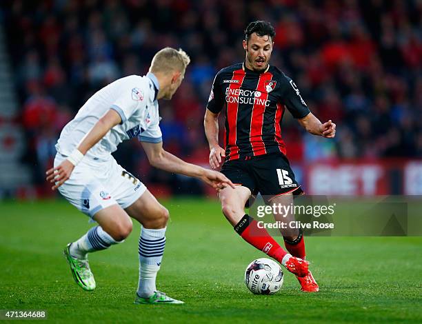 Adam Smith of Bournemouth takes on Dean Moxey of Bolton Wanderers during the Sky Bet Championship match between AFC Bournemouth and Bolton Wanderers...