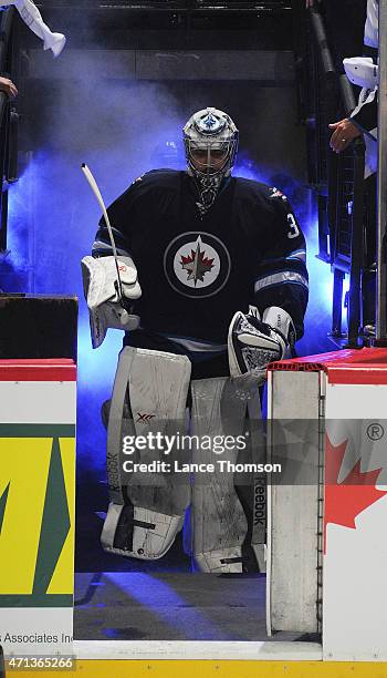 Goaltender Ondrej Pavelec of the Winnipeg Jets heads to the ice prior to puck drop against the Anaheim Ducks in Game Four of the Western Conference...