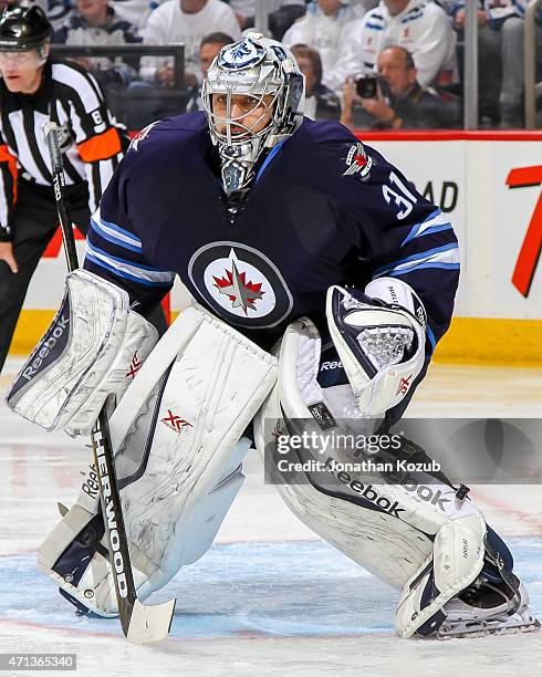 Goaltender Ondrej Pavelec of the Winnipeg Jets guards the net during second period action against the Anaheim Ducks in Game Four of the Western...