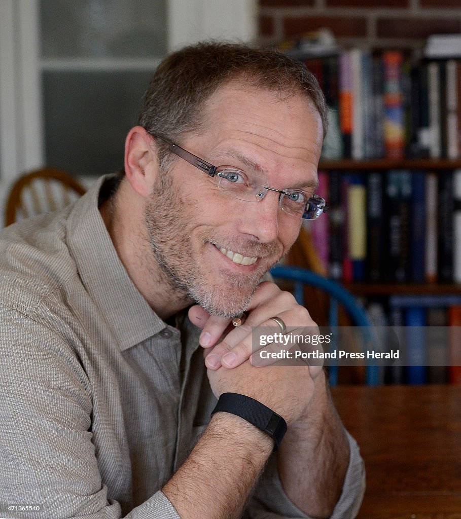 Avengers writer Alex Irvine at work in his South Portland home. News