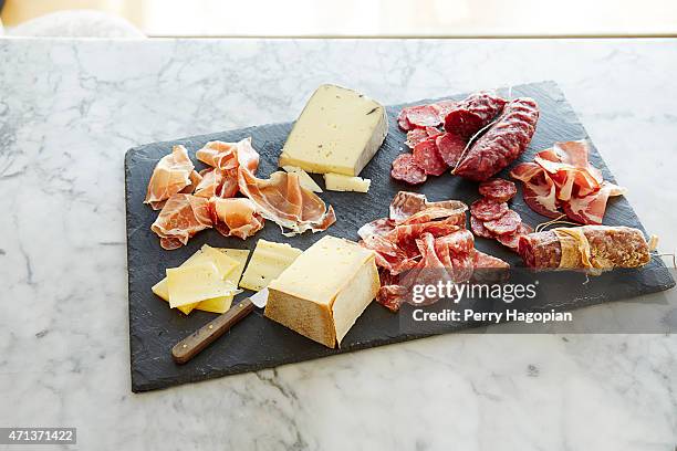 Cheese and meats are photographed for Cheese Connoisseur on October 27, 2014 in New York City.