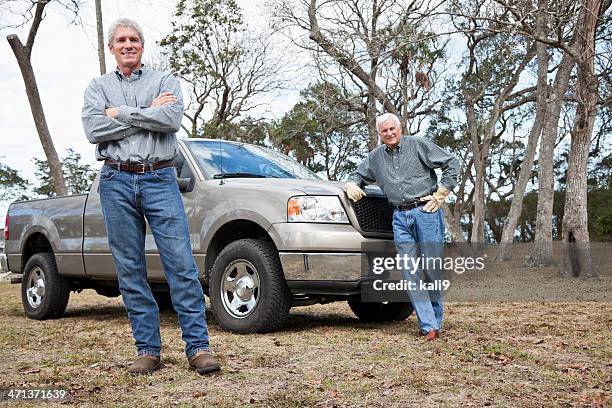 men standing by pickup truck - pickup truck accessories stock pictures, royalty-free photos & images