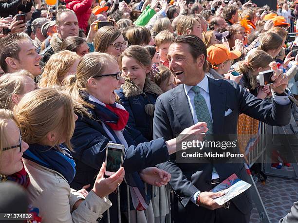 Prince Maurits of The Netherlands takes a selfie during King's Day celebrations on April 27, 2015 in Dordrecht, Netherlands.