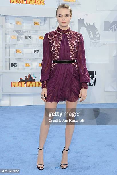 Cara Delevingne arrives at the 2015 MTV Movie Awards at Nokia Theatre L.A. Live on April 12, 2015 in Los Angeles, California.