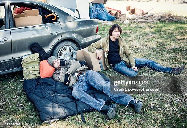 two homeless men living out of a car - squatter stock pictures, royalty-free photos & images