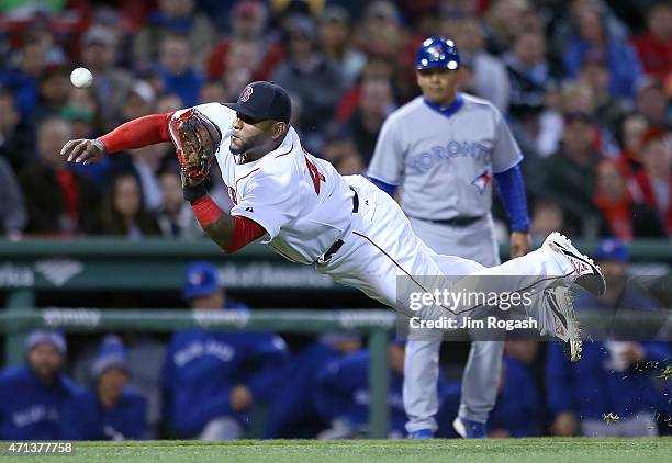 Pablo Sandoval of the Boston Red Sox makes a catch on a soft line drive off the bat Dalton Pompey of the Toronto Blue Jays in the fourth inning at...