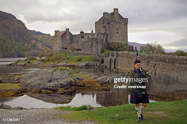 scottish piper - piper stock pictures, royalty-free photos & images