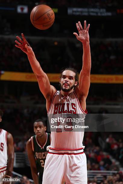 Joakim Noah of the Chicago Bulls shoots a free throw against the Milwaukee Bucks in Game Five of the Eastern Conference Quarterfinals during the NBA...