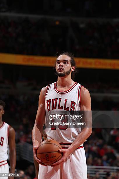 Joakim Noah of the Chicago Bulls prepares to shoot a free throw against the Milwaukee Bucks in Game Five of the Eastern Conference Quarterfinals...