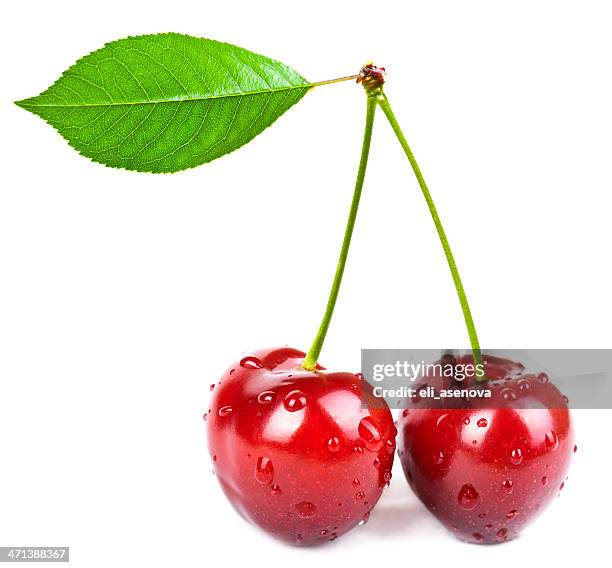 two red cherry with leaf isolated on white background - cherries stockfoto's en -beelden