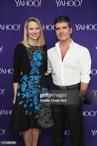 President and CEO of Yahoo! Marissa Mayer and TV personality Simon Cowell attend the 2015 Yahoo Digital Content NewFronts at Avery Fisher Hall on...