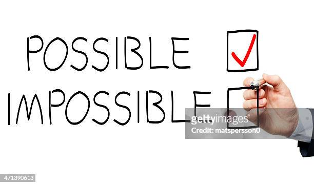 business man drawing a possible and impossible check box - possible stock pictures, royalty-free photos & images