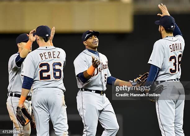 Jose Iglesias, Hernan Perez, Yoenis Cespedes and Joakim Soria of the Detroit Tigers celebrate a win of the game against the Minnesota Twins on April...