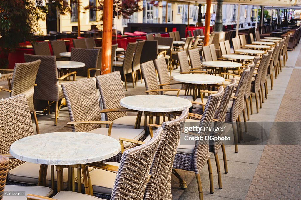 Rows of tables at outdoor cafe