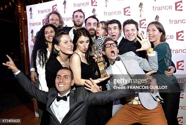 Actors pose after their play Les Franglaises" was awarded with the best musical show prize during the 27th Molieres French theatre award ceremony on...