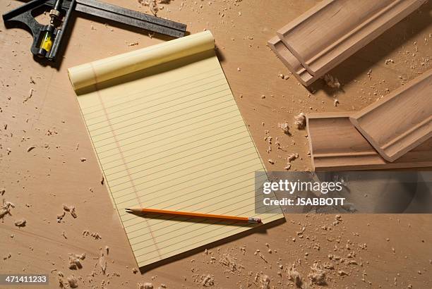 notepad and crown moulding - sawdust stock pictures, royalty-free photos & images