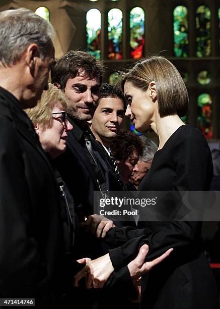 Queen Letizia of Spain greets victim's relatives as she attends the state funeral service for the victims of the Germanwings plane crash at the...