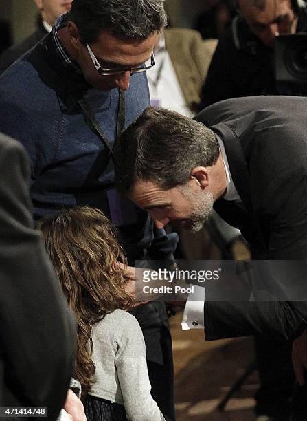 King Felipe VI of Spain gives his condolences to victim's relatives as he attends the state funeral service for the victims of the Germanwings plane...