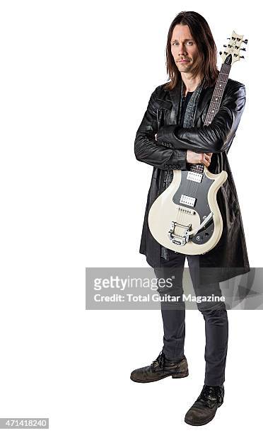 Portrait of American musician Myles Kennedy photographed with his PRS electric guitar in London on June 2, 2014. Kennedy is best known as a founding...