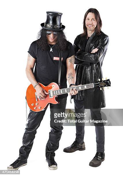 Portrait of musicians Myles Kennedy and Slash photographed in London on June 2, 2014.