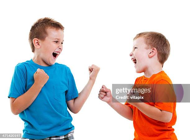 play fight - boys wrestling stock pictures, royalty-free photos & images