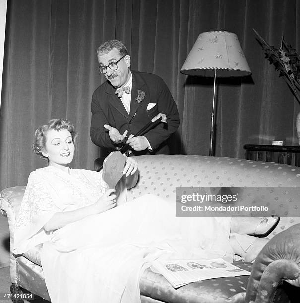 "Giuseppe De Filippo, known as Peppino, the Italian comic actor and playwright, together with the actress Lydia Marten, in a part taken from the...