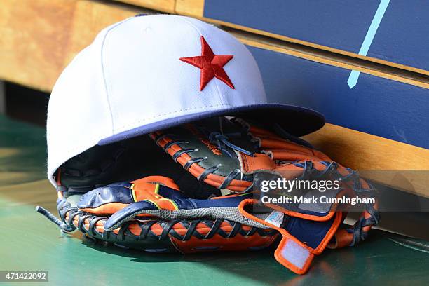 Detailed view of the baseball glove and Detroit Stars Negro League Tribute hat used by Miguel Cabrera of the Detroit Tigers during the game against...