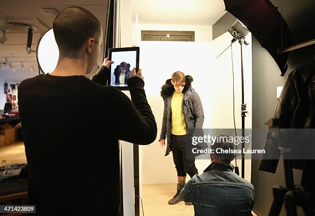 Model Chad White attends a fitting prior to a show for Black Sail by Nautica at Natuica Studio on January 31, 2014 in New York City.