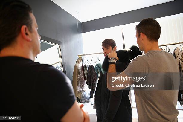 Vice President Design & Creative of Nautica Chris Cox and model Chad White attend a fitting prior to a show for Black Sail by Nautica at Natuica...