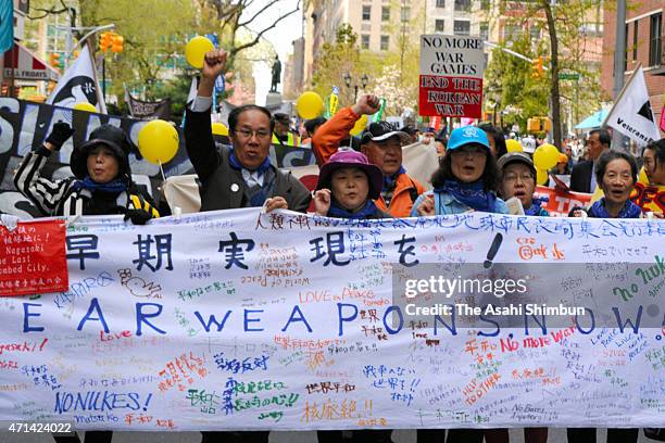Members of the Nagasaki Global Citizens' Assembly for the Elimination of Nuclear Weapon march on the street of New York on the sidelines of the 2015...
