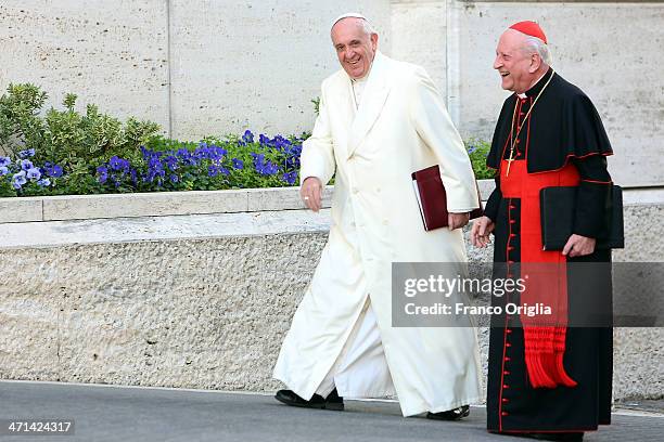 Pope Francis flanked by cardinal Franc Rode, arrives at the Paul VI Hall for the Extraordinary Consistory on the themes of Family on February 21,...