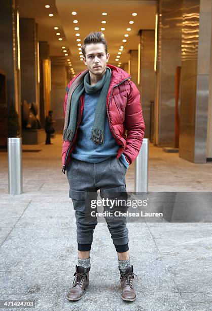 Adam Gallagher, menswear blogger of iamgalla.com seen wearing a red jacket, blue sweater, and pants by Black Sail by Nautica Fall 2014, with his own...