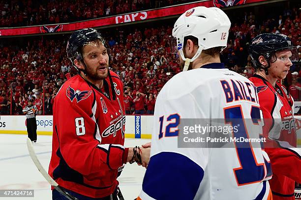 Alex Ovechkin of the Washington Capitals and Josh Bailey of the New York Islanders shake hands following the Capitals victory over the Islanders in...