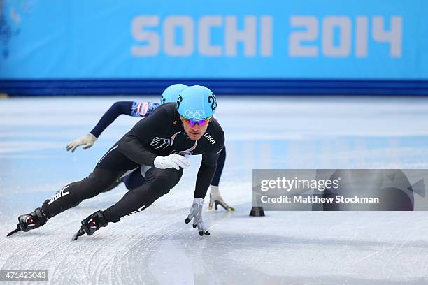 Eduardo Alvarez of the United States competes in the Short Track Men's 5000m Relay A on day fourteen of the 2014 Sochi Winter Olympics at Iceberg...