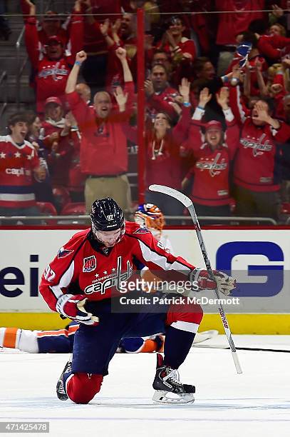 Evgeny Kuznetsov of the Washington Capitals celebrates afer scoring the game winning goal in the third period against the New York Islanders in Game...