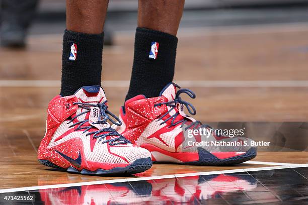 The shoes of DeMarre Carroll of the Atlanta Hawks in Game Three of the Eastern Conference Quarterfinals against the Brooklyn Nets during the 2015 NBA...