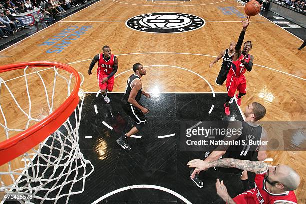 Dennis Schroder of the Atlanta Hawks drives to the basket in Game Three of the Eastern Conference Quarterfinals against the Brooklyn Nets during the...