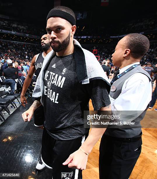 Deron Williams of the Brooklyn Nets walks off the court after Game Three of the Eastern Conference Quarterfinals against the Atlanta Hawks during the...