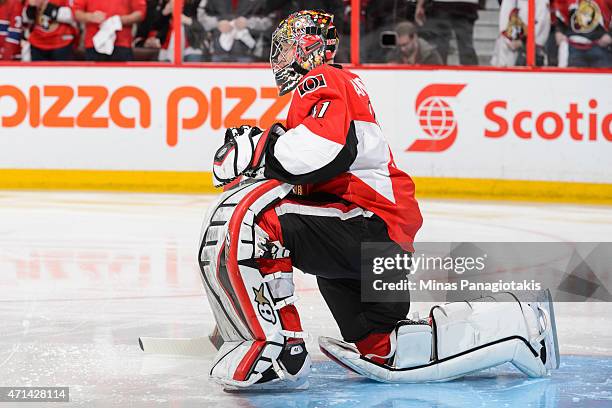 Craig Anderson of the Ottawa Senators stretches in Game Six of the Eastern Conference Quarterfinals during the 2015 NHL Stanley Cup Playoffs at...