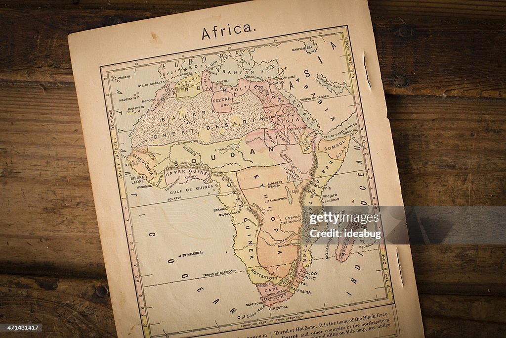 1867, Old Color Map of Africa, on Wood Background