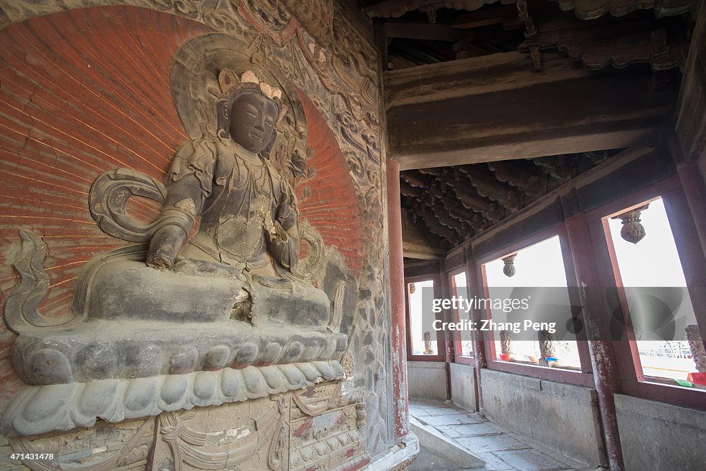 Buddhist statue carved on the Liuli-Wanshou pagoda (Glazed...
