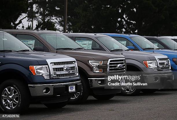 New Ford F-150 pickups are displayed on the sales lot at Serramonte Ford on April 28, 2015 in Colma, California. Ford Motor Co. Reported a 6.6...