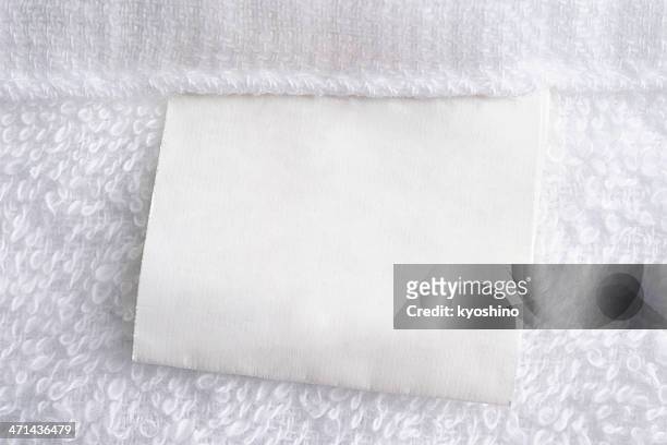 close up of white towel with blank label - clothing tag stock pictures, royalty-free photos & images