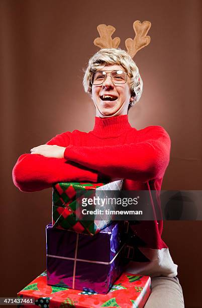 excited christmas boy portrait - ugly people stock pictures, royalty-free photos & images