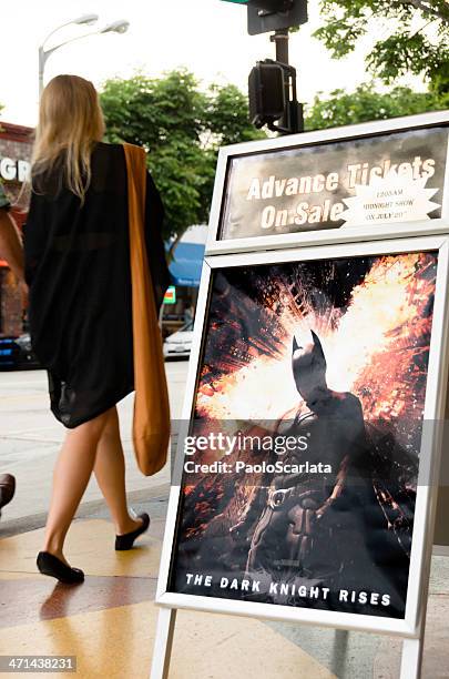 "the dark knight rises" movie poster - batman and robin stock pictures, royalty-free photos & images