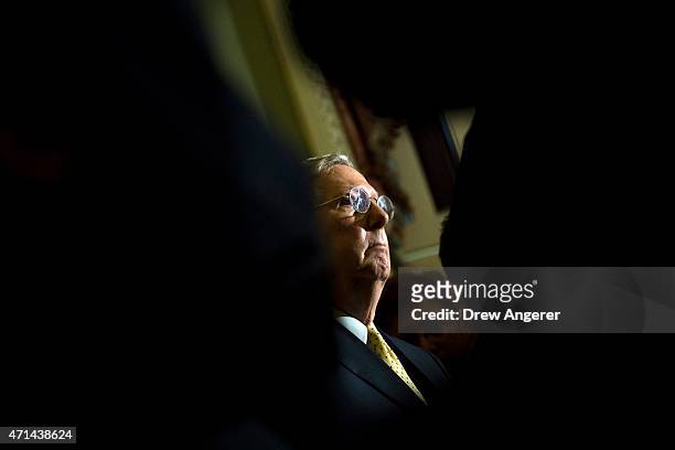 Senate Majority Leader Mitch McConnell listens to questions from reporters during a news conference after a policy meeting with Senate Republicans,...